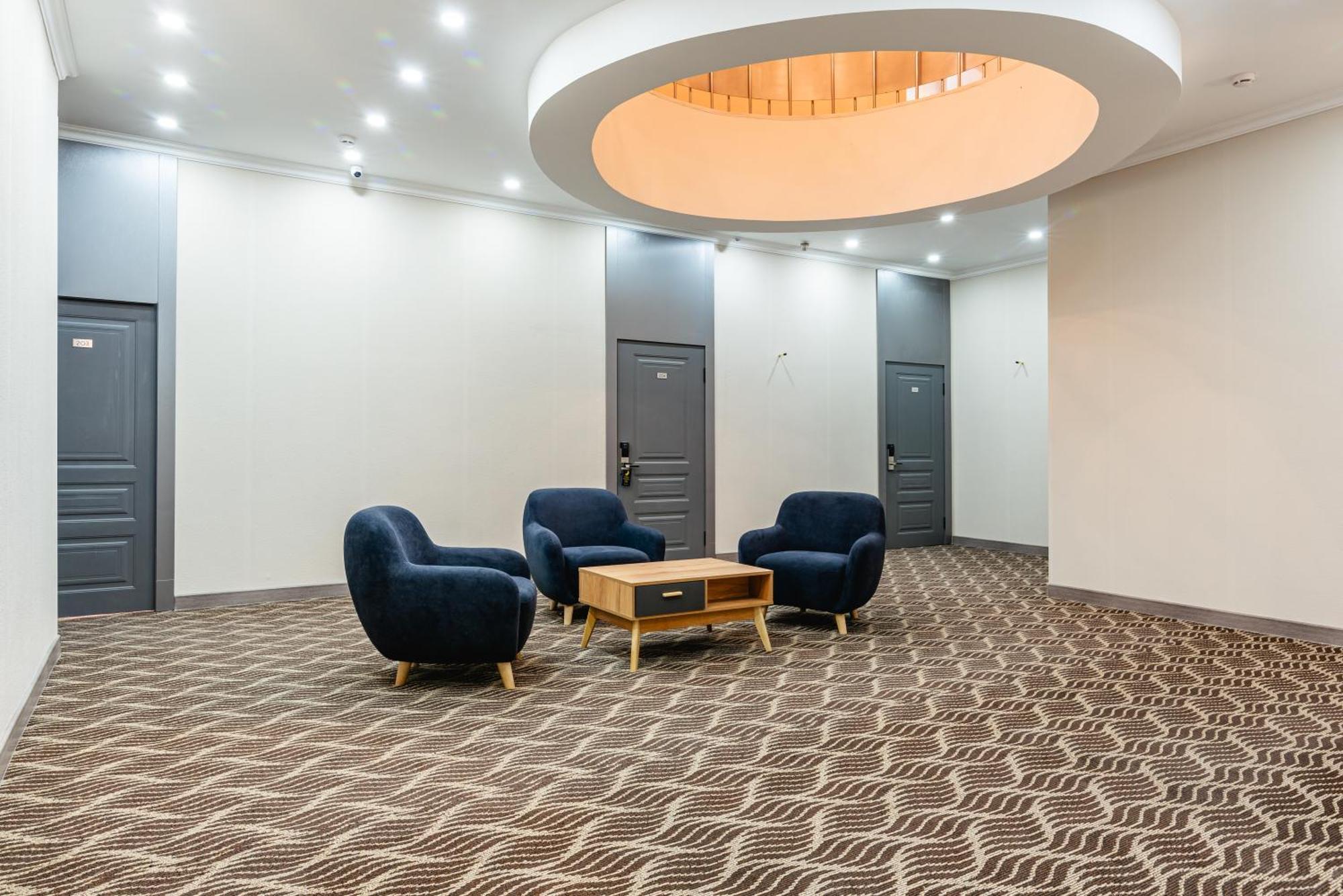 Aykun Hotel Almaty Bagian luar foto