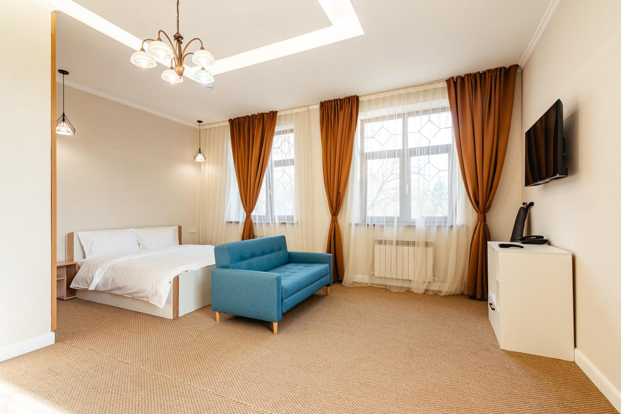 Aykun Hotel Almaty Bagian luar foto