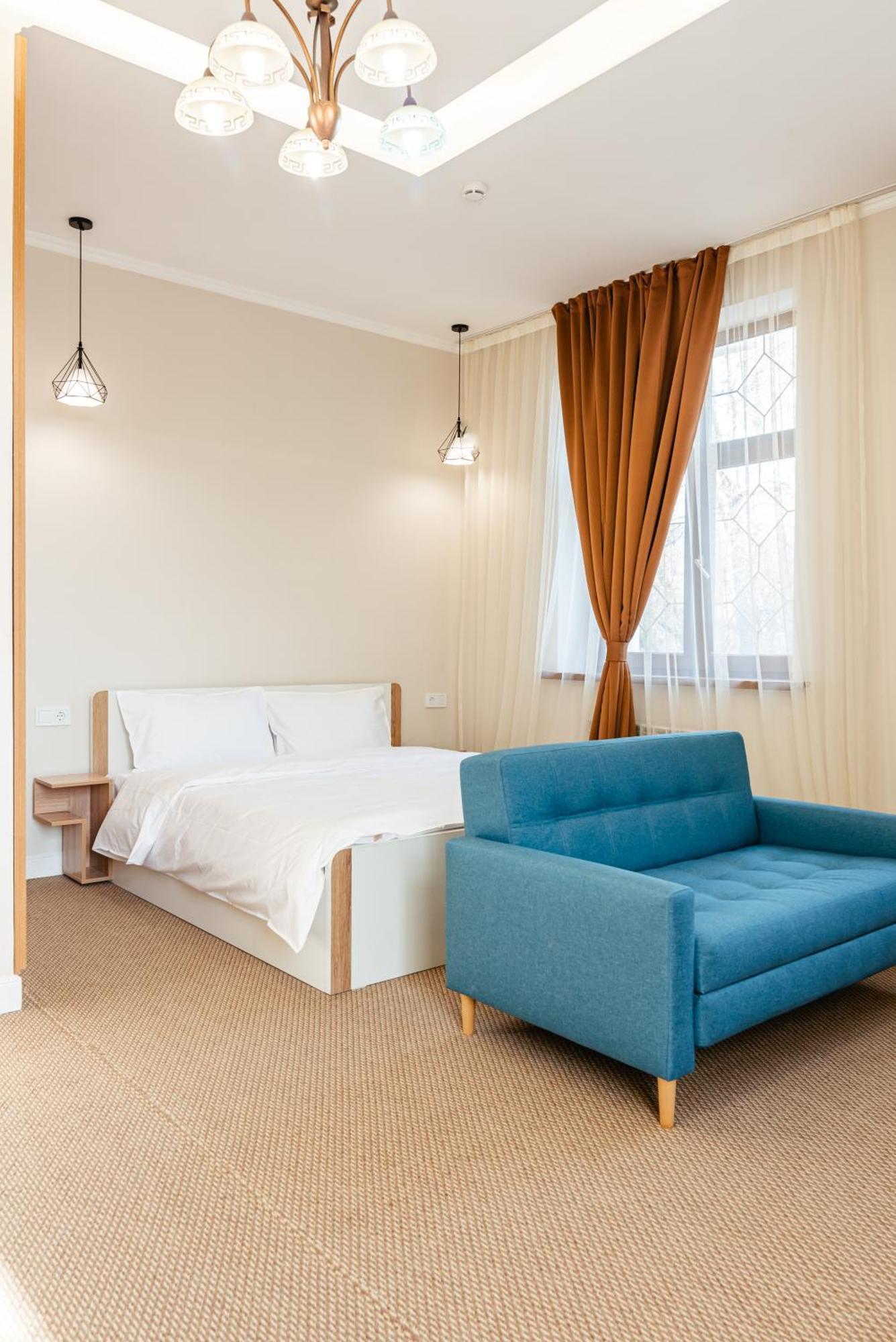 Aykun Hotel Almaty Bagian luar foto