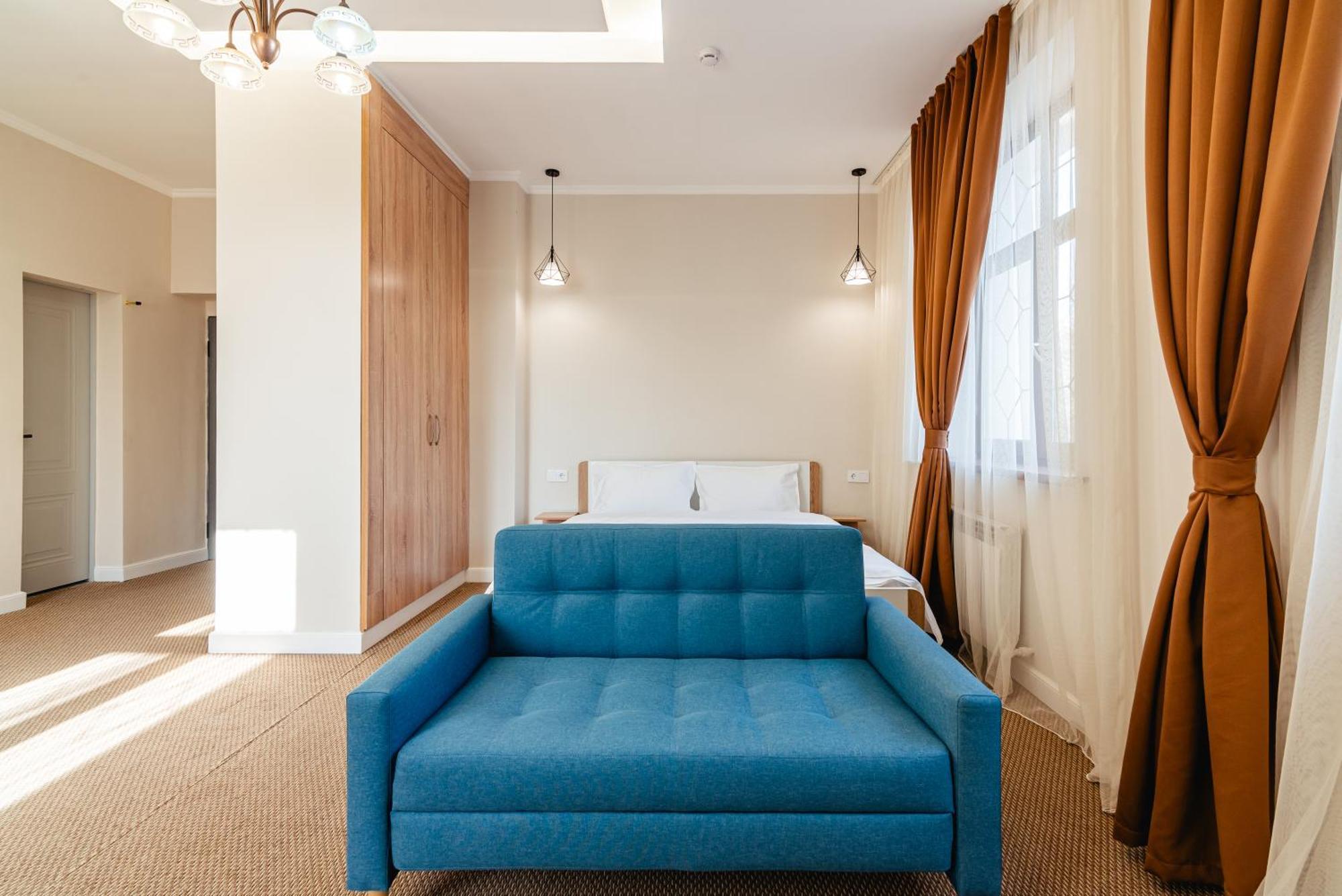 Aykun Hotel Almaty Bagian luar foto
